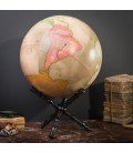 Globe terrestre rose sur support croisé en bois