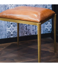 Pouf en cuir, pieds metal laitonné