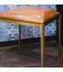 Brass plated wrought iron ottoman with leather top