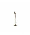 Brass bird sculpture on base