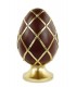 Oeuf en chocolat sur socle doré - décoration de Pâques